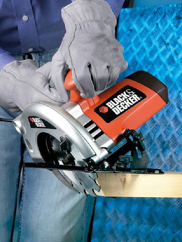 Person using a Black & Decker circular saw