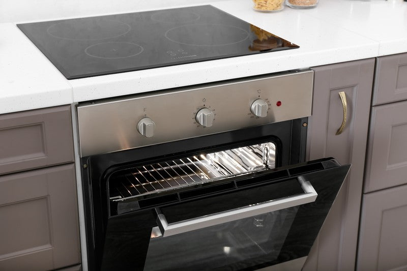 Stainless steel oven with open door in a kitchen setting