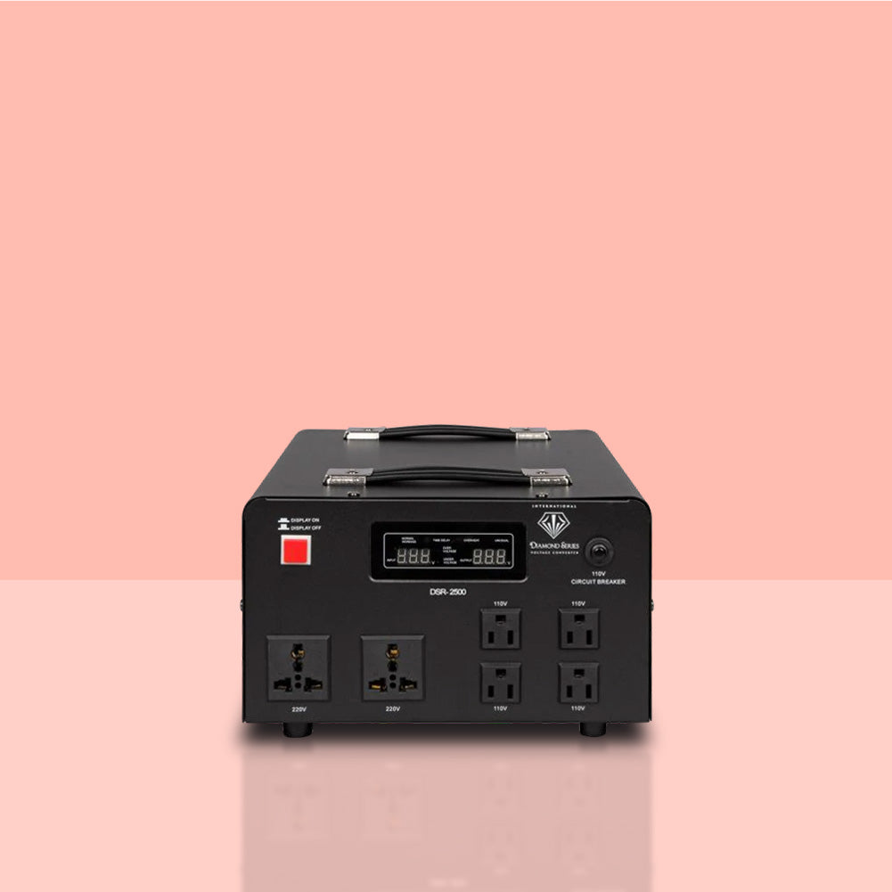 Black voltage converter on a pink background