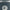 Insinkerator Evolution 100 Garbage Disposal unit in gray color, zoom view.