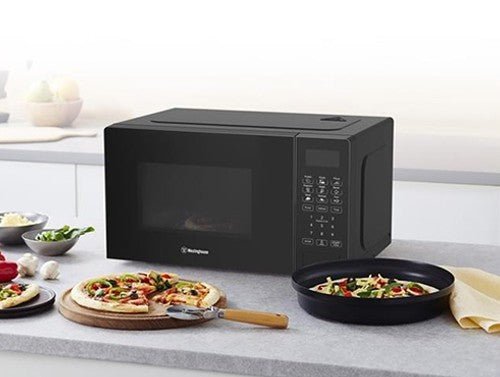 Westinghouse 220 volts microwave black color 20 LIter .7 cu ft 220v 240 volt 50 hz - 220v volt electronics